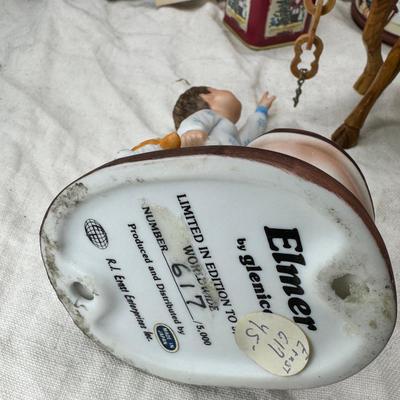 Sale Photo Thumbnail #221: Purple bohemian glass vase with small chip in rim, Resin camel 4 working music boxes, 1 Christmas snow globe.