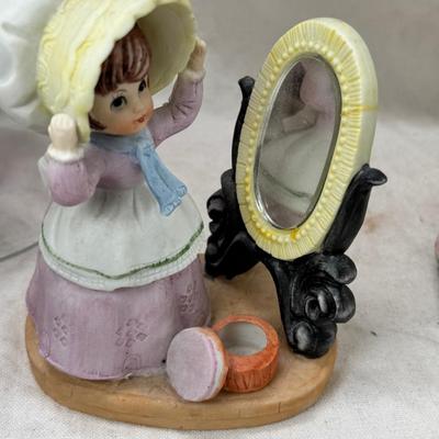 Sale Photo Thumbnail #229: Purple bohemian glass vase with small chip in rim, Resin camel 4 working music boxes, 1 Christmas snow globe.