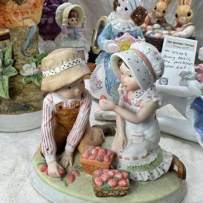 Sale Photo Thumbnail #222: Purple bohemian glass vase with small chip in rim, Resin camel 4 working music boxes, 1 Christmas snow globe.