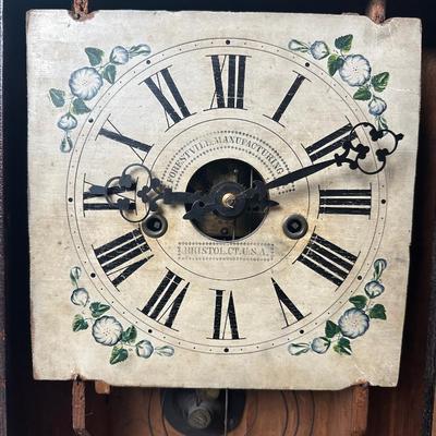 Antique Forestville Manufacturing Co. Eight-Day Wood Wall Clock