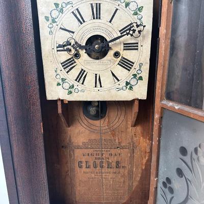 Antique Forestville Manufacturing Co. Eight-Day Wood Wall Clock