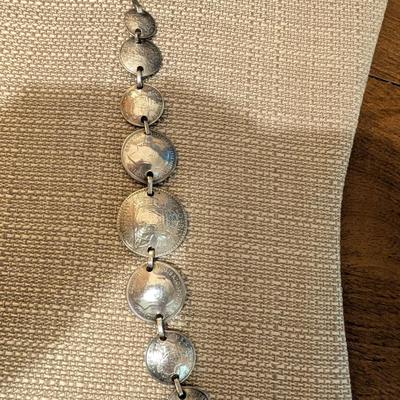 Pop out coin bracelet