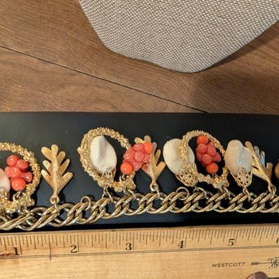 Chunky gold tone fall charm bracelet.