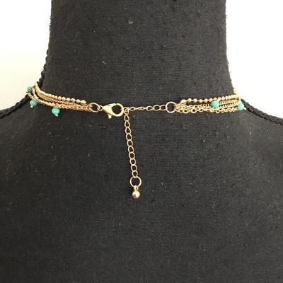 Super cute, gold toned, layered multicolored, caged, glass necklace. Super cute.