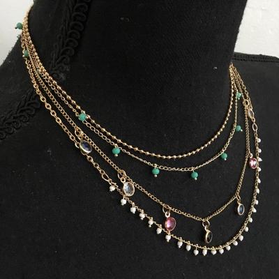 Super cute, gold toned, layered multicolored, caged, glass necklace. Super cute.