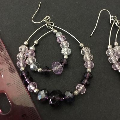 Beautiful facet of glass, light and dark purple statement earrings