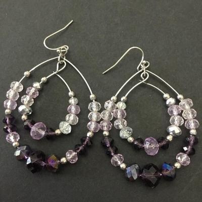 Beautiful facet of glass, light and dark purple statement earrings