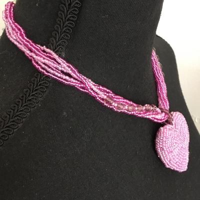 Super cute very nice fuchsia, purple glass bead necklace with puffy heart pendant