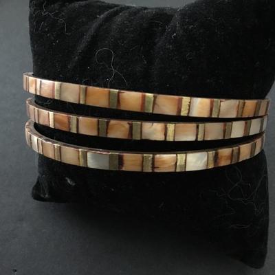 Set of three vintage brass Shell in Lay, bangle bracelets