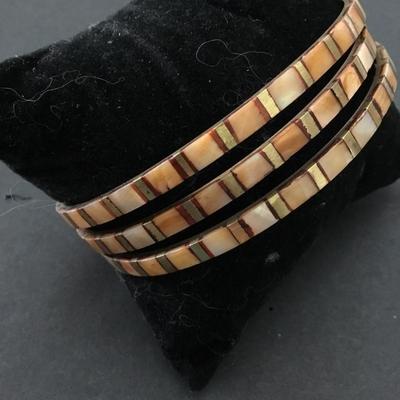 Set of three vintage brass Shell in Lay, bangle bracelets