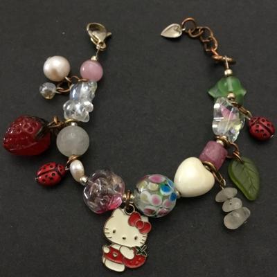 Cute vintage glass and crystal. Hello Kitty charm bracelet.