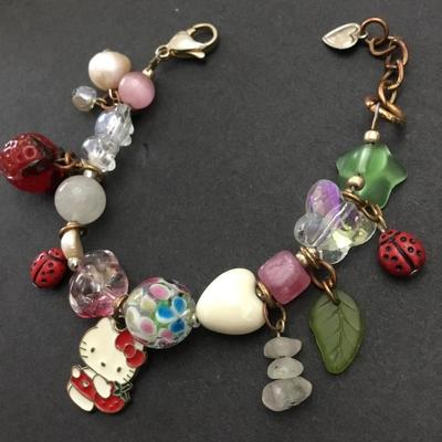 Cute vintage glass and crystal. Hello Kitty charm bracelet.