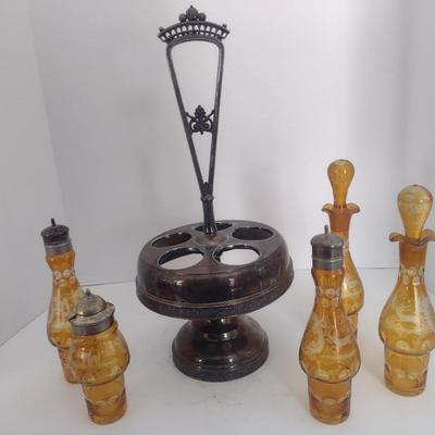 Vintage Rockford Silver Company Quadruple Plated Five Bottle Amber Glass Caster Cruet Set