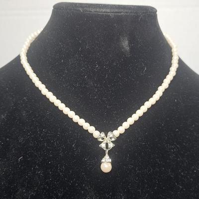 Vintage Faux Pearl Necklace with Rhinestone Bow Drop Pendant – Silver-Tone Clasp