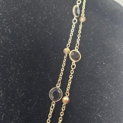 Layered Gold-Tone Chain Necklace with Faceted Black Stone Accents