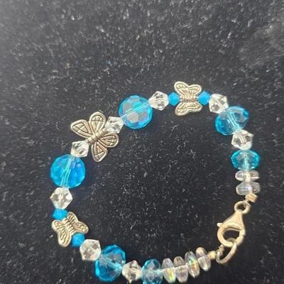Blue Faceted Crystal Butterfly Charm Bracelet with Gold-Tone Clasp