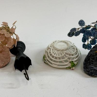 Sale Photo Thumbnail #541: This is a collection of miniature decorative objects, including two gemstone trees, a small ceramic basket, and a metal umbrella stand. All in good condition.