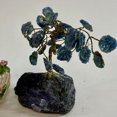 Sale Photo Thumbnail #542: This is a collection of miniature decorative objects, including two gemstone trees, a small ceramic basket, and a metal umbrella stand. All in good condition.