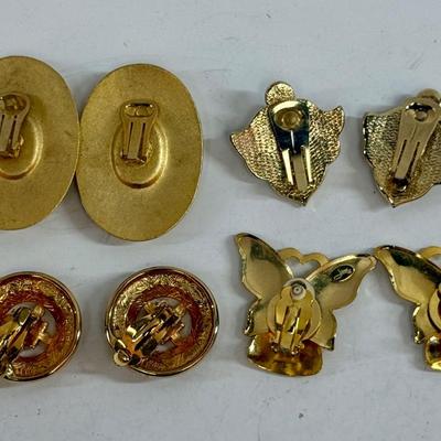 Sale Photo Thumbnail #547: 4 pair of gold-tone clip-on earrings. All in good condition.