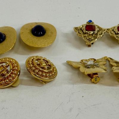 Sale Photo Thumbnail #550: 4 pair of gold-tone clip-on earrings. All in good condition.