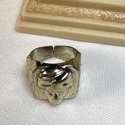 Sale Photo Thumbnail #317: See pics. Gold ring with figure is plastic.