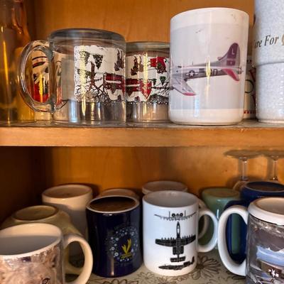 Cupboard full of mugs, glasses, etc