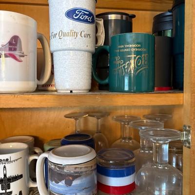 Cupboard full of mugs, glasses, etc