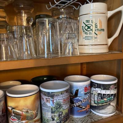 Cupboard full of mugs, glasses, etc