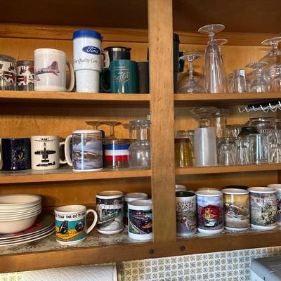 Cupboard full of mugs, glasses, etc