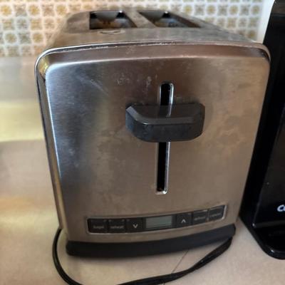 Bread maker, toaster, and can opener
