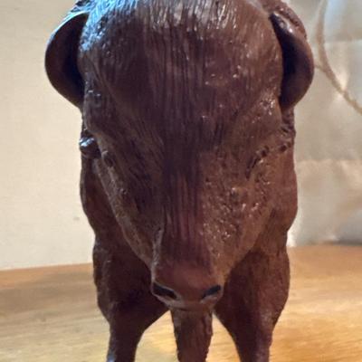 E. Millburn carved Bison
