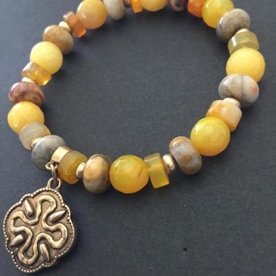 Beautiful, vintage stone bead stretch bracelet with charm