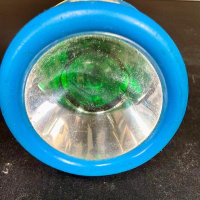 Sale Photo Thumbnail #559: Vintage Playskool color-changing toy flashlight, originally released around 1986. Has a knob to change the lens from red to clear to green. Untested, but appears to be in good working condition.