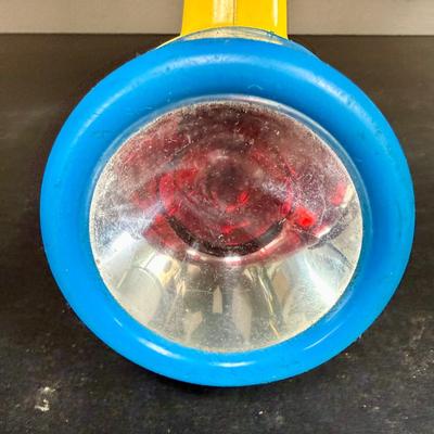 Sale Photo Thumbnail #558: Vintage Playskool color-changing toy flashlight, originally released around 1986. Has a knob to change the lens from red to clear to green. Untested, but appears to be in good working condition.