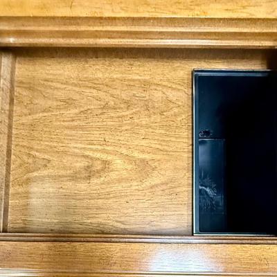 Sale Photo Thumbnail #573: From the early 1970's, pecan finish. Untested. Contains a record player and AM/FM Stereo Receiver Caster wheels underneath to make repositioning easy. Measures approx. 54" x 20" x 27" high. Speakers measure 16" x 11" x 23" high. Includes original paperwor