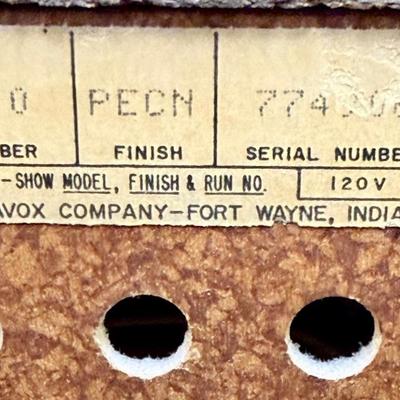 Sale Photo Thumbnail #588: From the early 1970's, pecan finish. Untested. Contains a record player and AM/FM Stereo Receiver Caster wheels underneath to make repositioning easy. Measures approx. 54" x 20" x 27" high. Speakers measure 16" x 11" x 23" high. Includes original paperwor