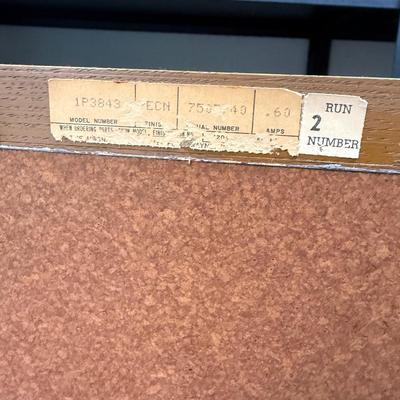 Sale Photo Thumbnail #582: From the early 1970's, pecan finish. Untested. Contains a record player and AM/FM Stereo Receiver Caster wheels underneath to make repositioning easy. Measures approx. 54" x 20" x 27" high. Speakers measure 16" x 11" x 23" high. Includes original paperwor