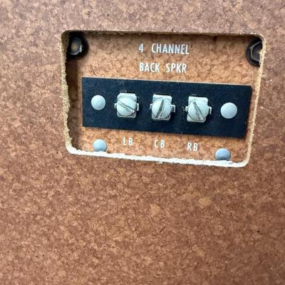 Sale Photo Thumbnail #583: From the early 1970's, pecan finish. Untested. Contains a record player and AM/FM Stereo Receiver Caster wheels underneath to make repositioning easy. Measures approx. 54" x 20" x 27" high. Speakers measure 16" x 11" x 23" high. Includes original paperwor