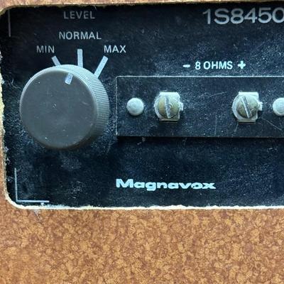 Sale Photo Thumbnail #586: From the early 1970's, pecan finish. Untested. Contains a record player and AM/FM Stereo Receiver Caster wheels underneath to make repositioning easy. Measures approx. 54" x 20" x 27" high. Speakers measure 16" x 11" x 23" high. Includes original paperwor