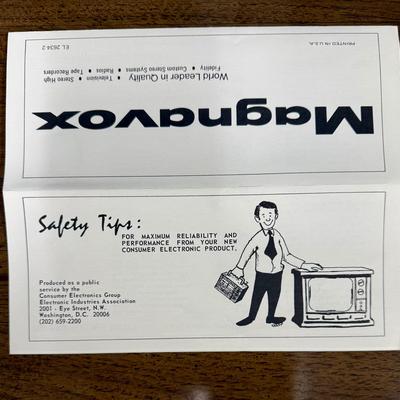 Sale Photo Thumbnail #579: From the early 1970's, pecan finish. Untested. Contains a record player and AM/FM Stereo Receiver Caster wheels underneath to make repositioning easy. Measures approx. 54" x 20" x 27" high. Speakers measure 16" x 11" x 23" high. Includes original paperwor