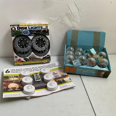 647 Lot of New Solar Disk Lights, Umbrella, Puck Lights