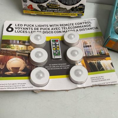 647 Lot of New Solar Disk Lights, Umbrella, Puck Lights