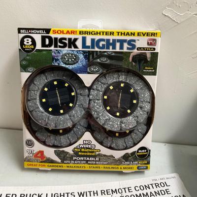 647 Lot of New Solar Disk Lights, Umbrella, Puck Lights