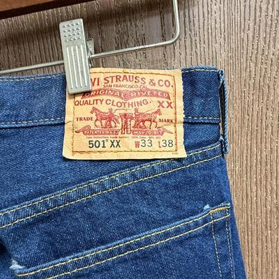 Sale Photo Thumbnail #405: Pre-washed to a slightly faded medium blue color. Good condition.