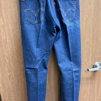 Sale Photo Thumbnail #413: Pre-washed to a slightly faded medium blue color.  Good condition.