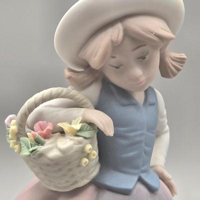 LOT 26L: Lladro Sweet Scent Girl and Mrs. Claus Figurines