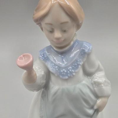 LOT 26L: Lladro Sweet Scent Girl and Mrs. Claus Figurines
