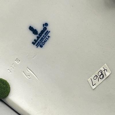 LOT 47: Lladro Children Playing SeeSaw Figurine