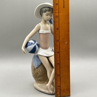 LOT 55L: Lladro Summer Figurine - Beach Girl with Ball