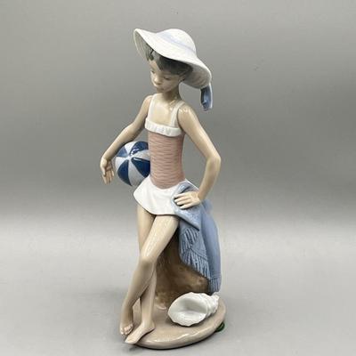 LOT 55L: Lladro Summer Figurine - Beach Girl with Ball